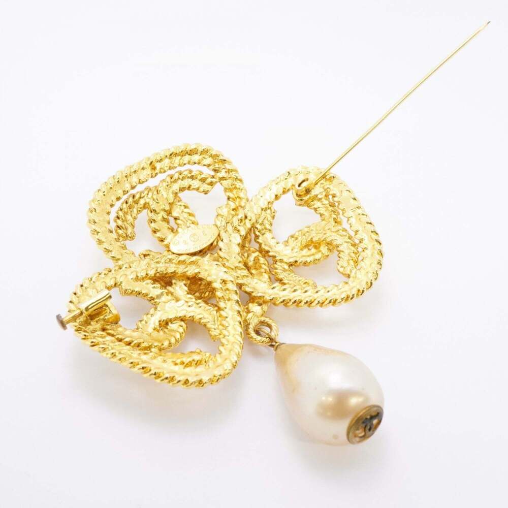 CHANEL Gold Pearl Logo Brooch - Picture 6 of 10